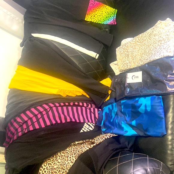 ZYIA Pants - 12 pairs of Zyia leggings, 1 NWT rest only worn once or twice all size 8-10